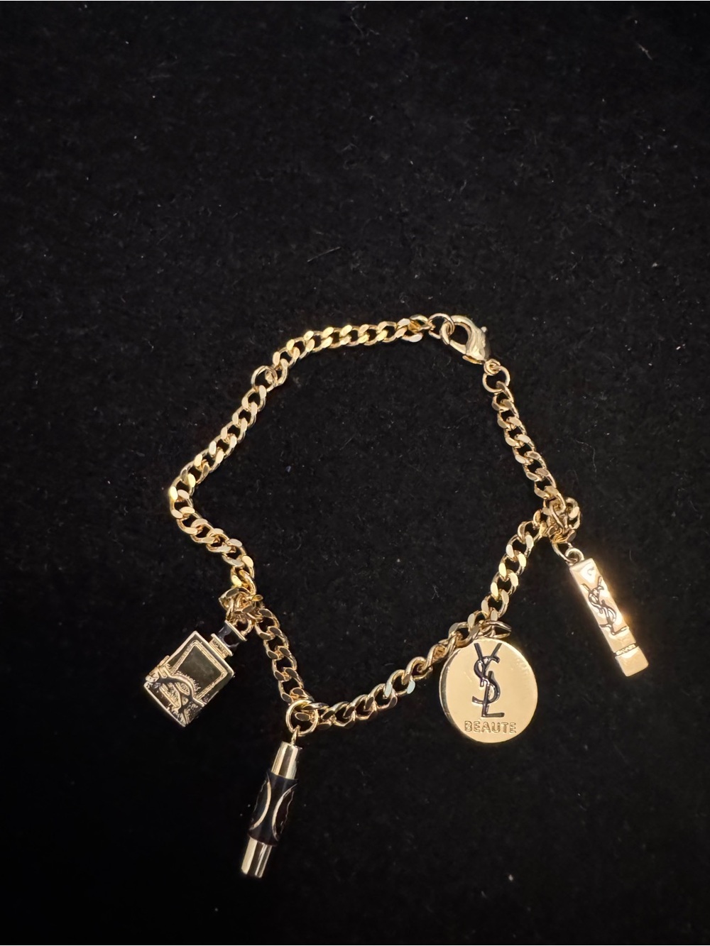 Yves Saint Laurent Gold-Tone Charm Bracelet with YSL Medallion